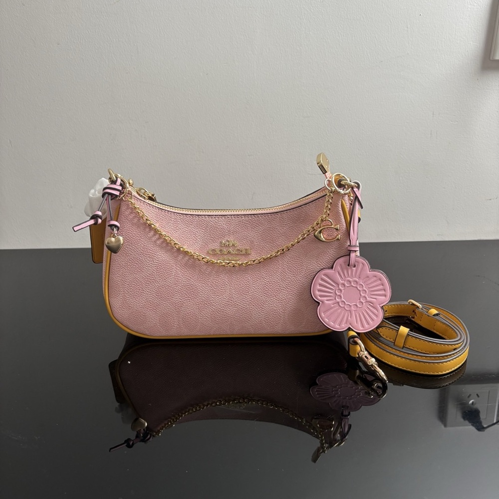 Coach Pink Leather Shoulder Bag with Yellow Trim & Floral Charm